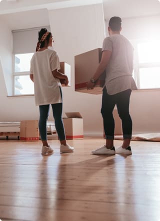 Buy-to-Let Mortgages | A couple unboxing their belongings in a new apartment