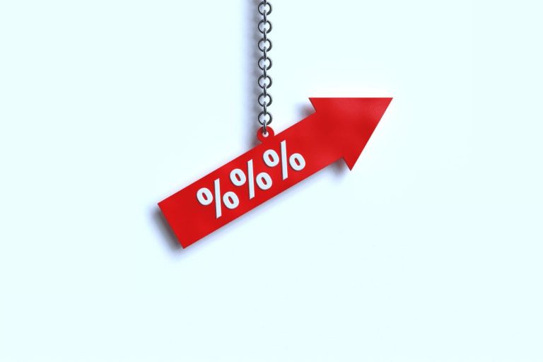 Mortgage Rate Inflation | Graphic of a red arrow with 3 percent symbols on, held up my a chain on a white background