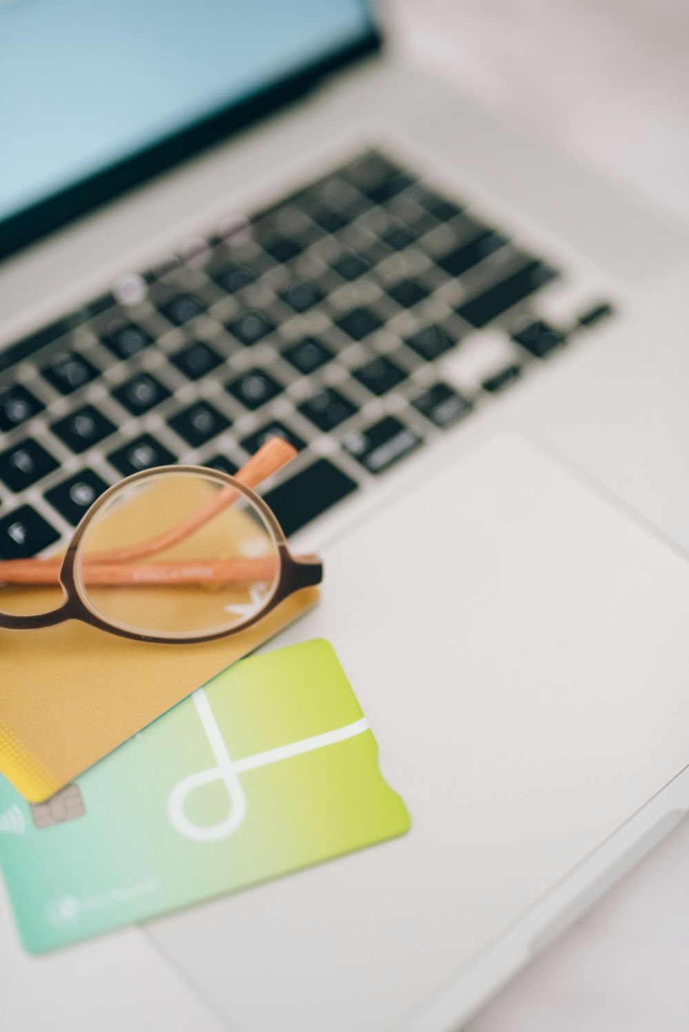 a pair of glasses on a laptop